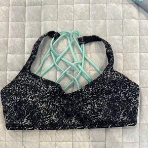 Lululemon Athletica Black and Green Sports Bra with Strappy Design